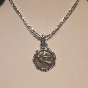 Silver Dove Pendant Necklace in Gold-Tone Center